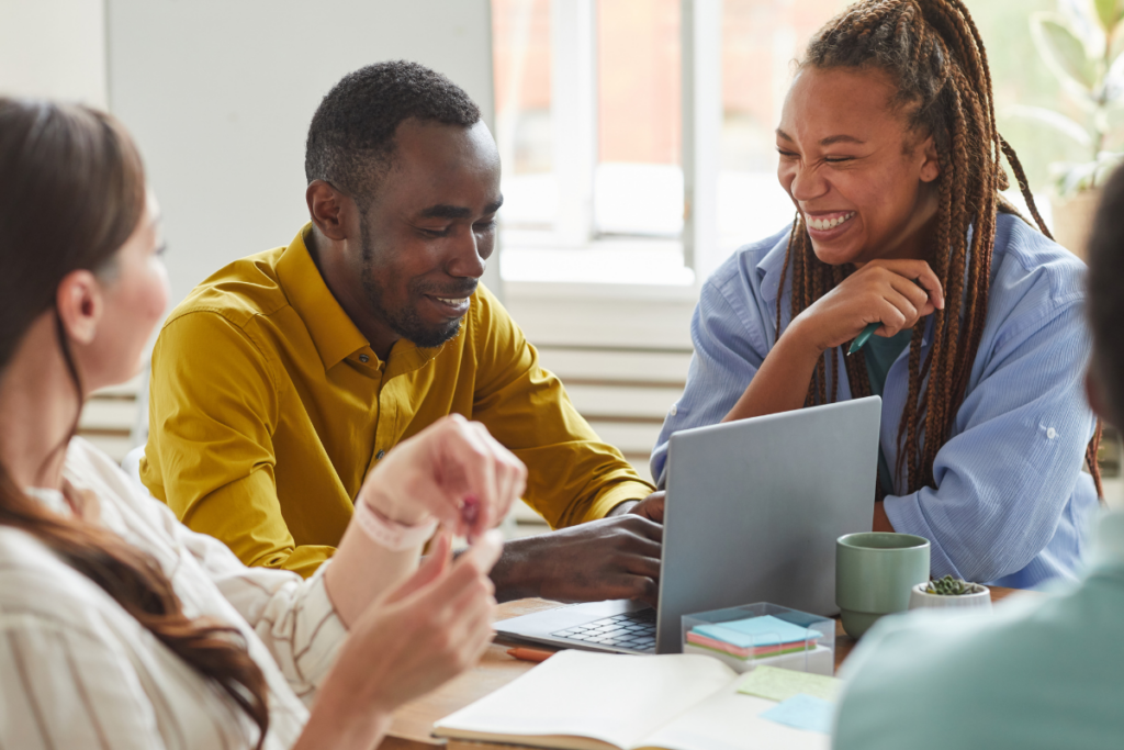 Diverse group of individuals connecting through conversation.