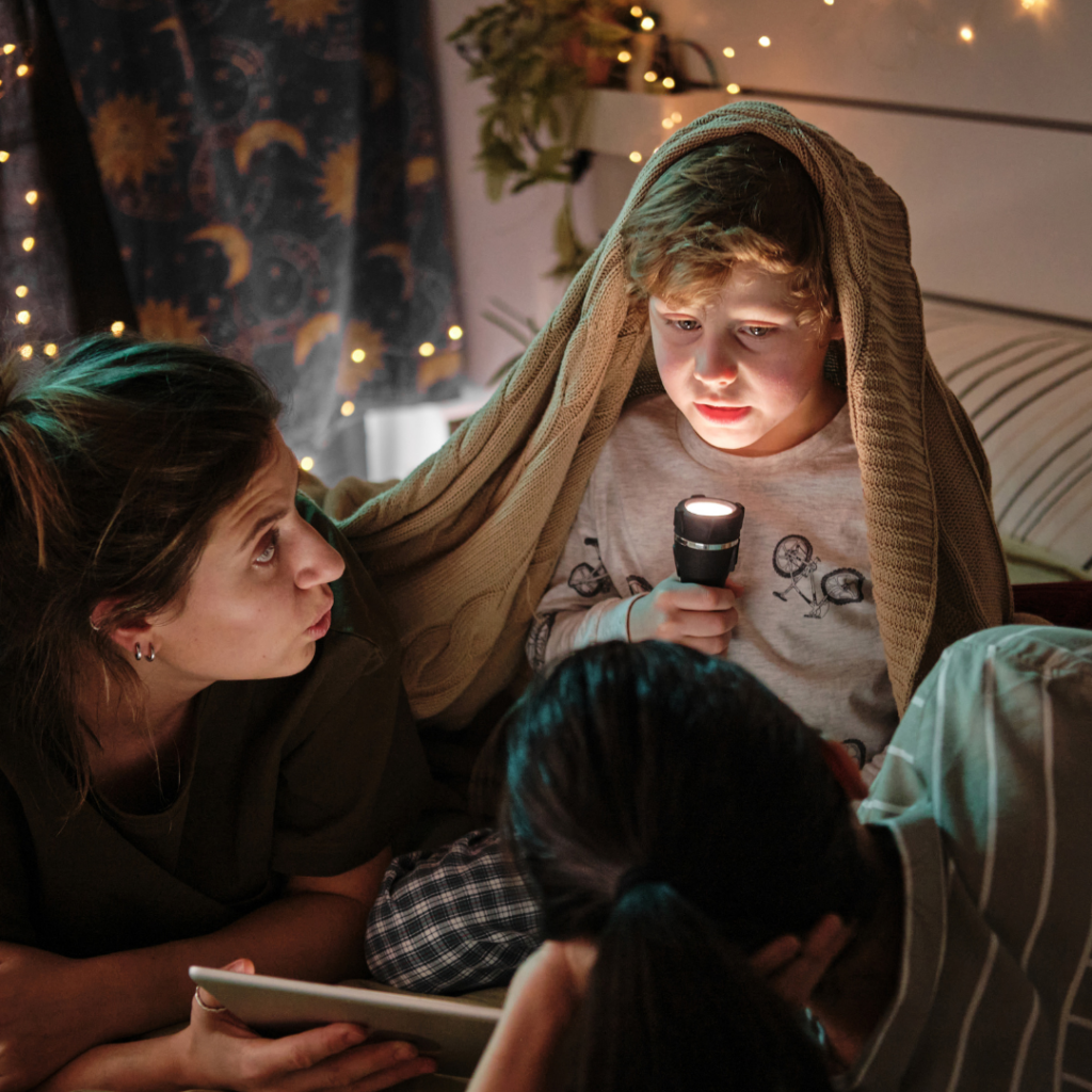 eerie tales: family in a room telling stories