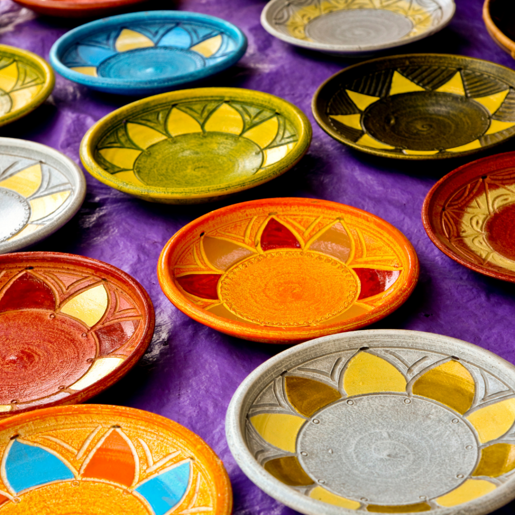 An artist combining traditional African art elements with modern design, showcasing cultural evolution and artistic endeavours