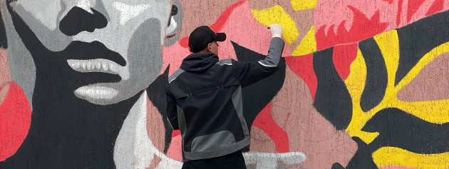 A vibrant mural advocating for social justice, illustrating art’s role in activism.