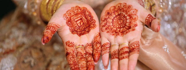 Global traditions: henna hand tattoo on a woman
