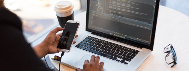 innovative creations: a person using a laptop and phone