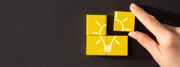 Innovative creations: cubes and ideas being arranged