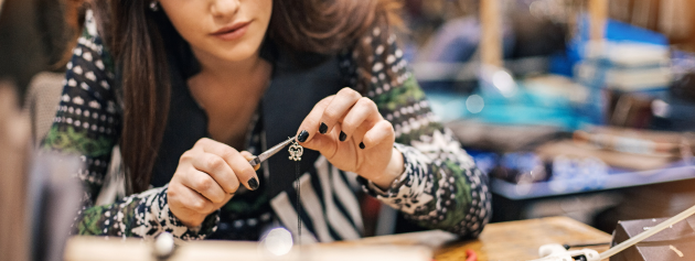 An individual working in a studious environment, illustrating the process of capturing daily inspirations.