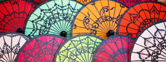 Global traditions: fans displaying cultural designs
