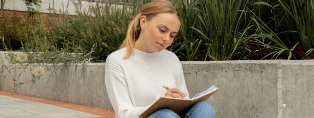 Self-discovery: A woman journalling