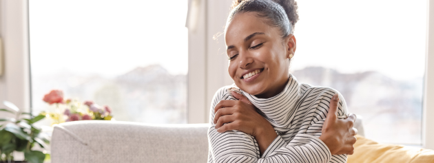 Self-Discovery: A woman embracing herself