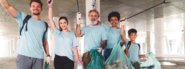 community service narratives: Group of happy volunteers